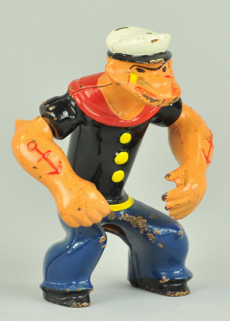 POPEYE CAST IRON MOTORCYCLE FIGURE: Hubley, figure for the popular motorcycle toy, circa 1935, arms are movable. 4 3/4" h.