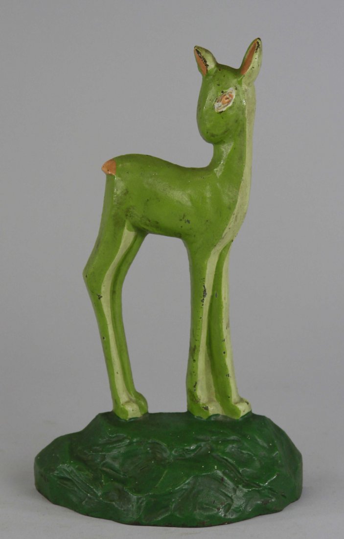 FAWN DOORSTOP: "No. 6 © 1930, Taylor Cook," great design, depicts tall standing fawn on green grass, wonderful child's themed doorstop. 9 7/8" x 5 3/4".