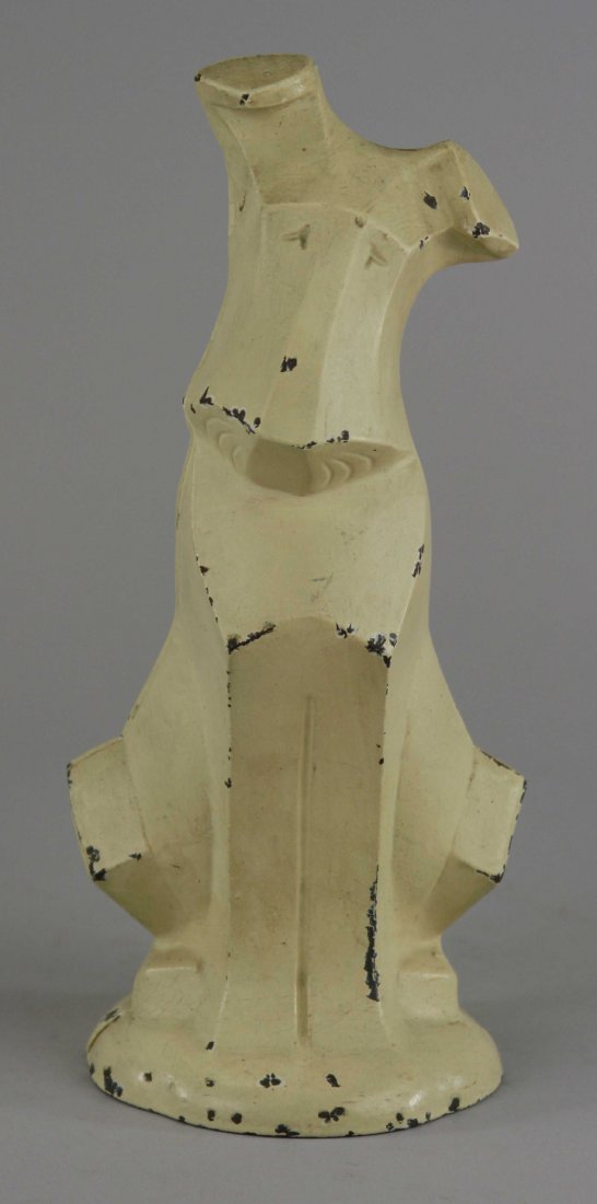 MODERNISTIC (SCOTTIE) PUP DOORSTOP: Full figure, Hubley, Cat. #316, cast iron, whimsical piece depicts deco styled Scottie w/head cocked to side. 10 3/4" x 4 3/4".