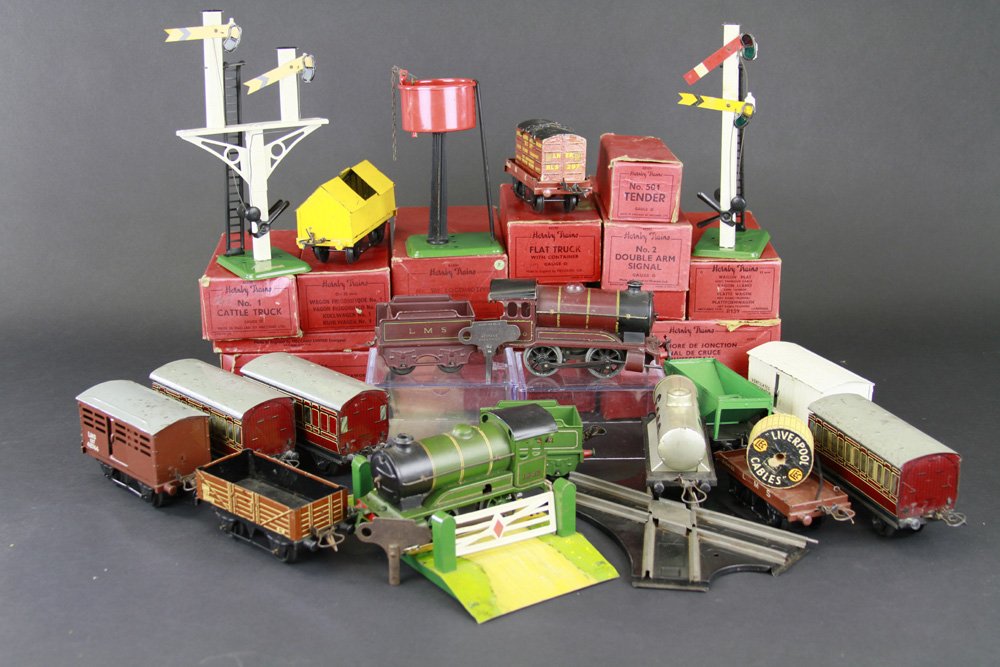 HORNBY 501 TRAIN SETS: Includes two sets of 'O' Gauge by Hornby, England, lithographed tin, one includes three coaches, other includes varied freight cars & accessories, many interior boxed pieces in freight set. Loco 6 1/2