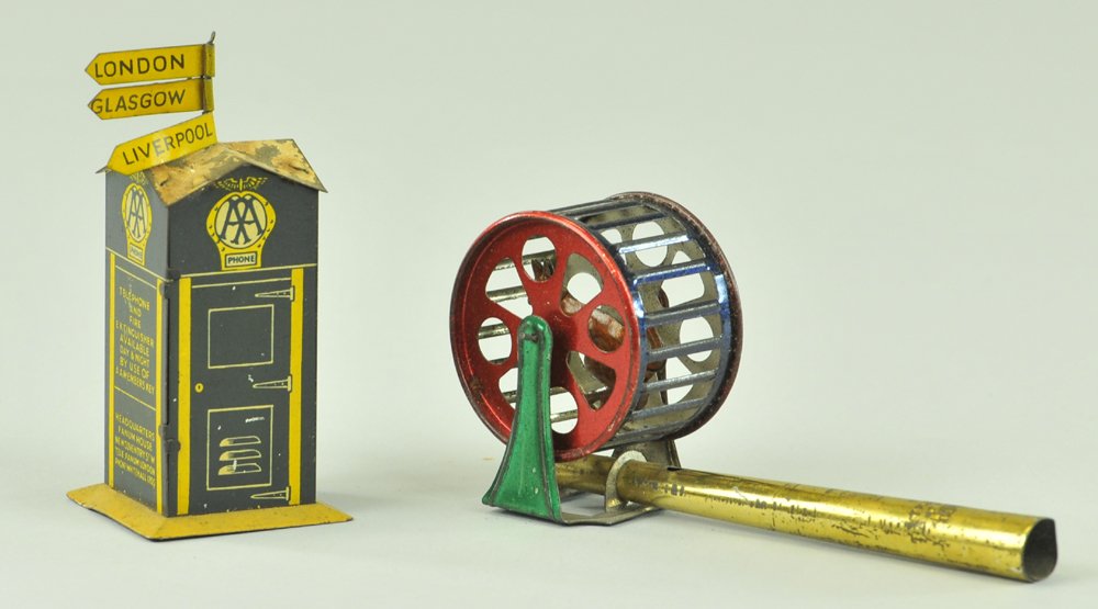 LOT OF TWO PENNY TOYS: Includes Squirrel in Cage Whistle and Phone Booth, whistle has gold finished pipe w/blue, green, and red cage containing tin litho squirrel which is great visually when operated, phone booth is an AA 