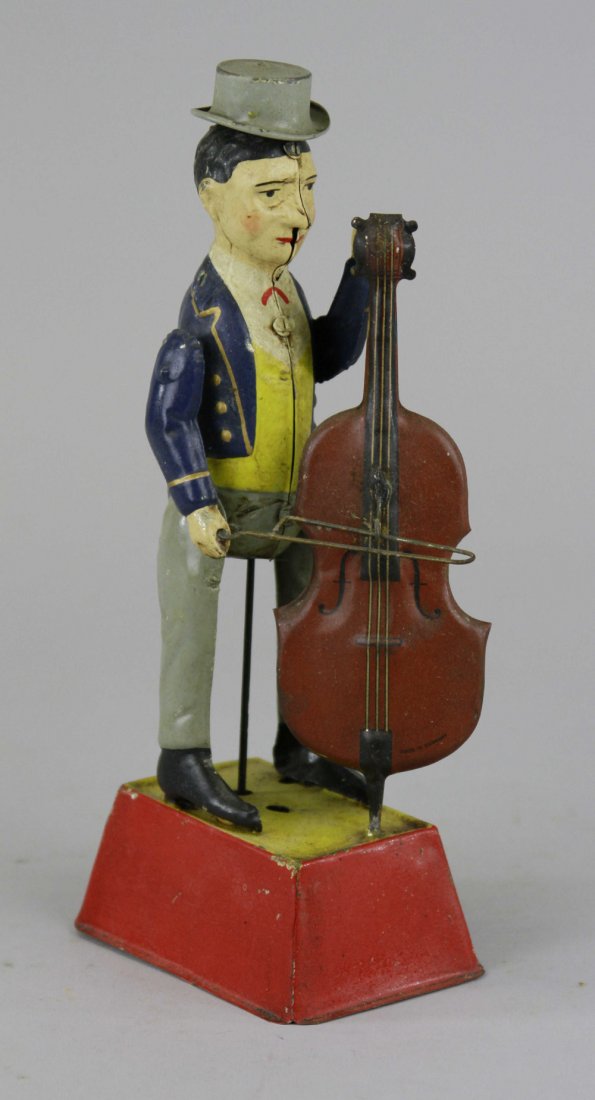 MAN PLAYING BASS: Germany, Gunthermann, whimsical depiction of standing figure holding bass and bow in hand, able to emit sound when clockwork is activated, great action. 10" h.
