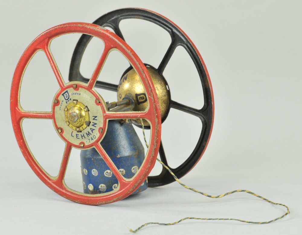 LEHMANN FUTURUS PEACE CHIME: Germany, steel cased shell from the scrap yards of World War I, housed in familiar zig zag spoke wheels, Lehmann gesture of no more war, but peace in the future, interior gold hubs marked, "Futurus." 
