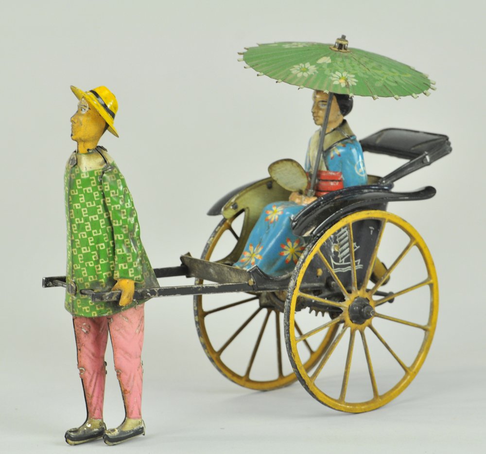 LEHMANN MASUYAMA: Germany, lithographed and hand painted tin, attractive toy features Asian Lady in rickshaw w/floral designed parasol, clockwork mechanism. 6 3/4" l.