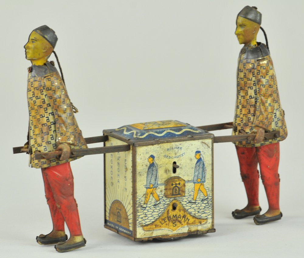 LEHMANN KADI: Germany, lithographed and hand painted tin, friction mechanism, depicts two Chinese figures hauling colorful tea chest. 7" l.