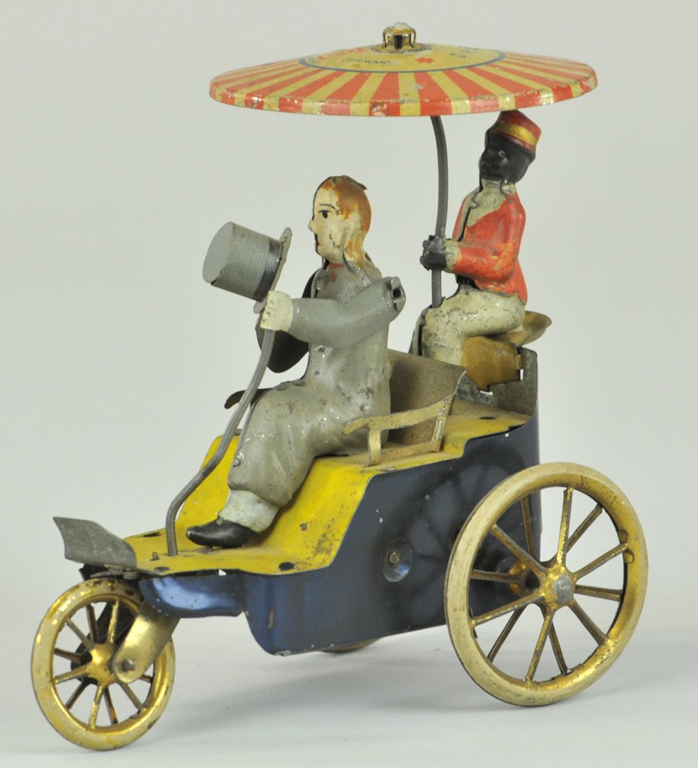LEHMANN NEW CENTURY CYCLE: Germany, lithographed tin, red and white striped umbrella, classic portrayal of the 1895 Berlin pedal-engine cab, driver holds hat, clockwork driven. 5" l.