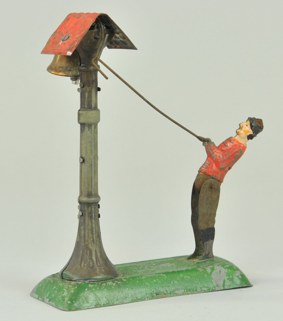 MARTIN MAN RINGING BELL IN TOWER: France, spirit painted, depicts man on green platform w/wire in hand ringing bell attached to covered bell roof. 7" h.