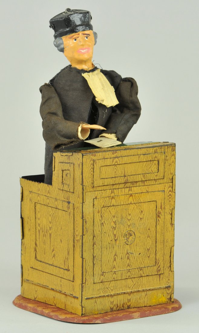 THE ADVOCATE: Ferdinand Martin, France, lithographed tin podium w/standing figure, hand painted tin head, cloth suit, when clockwork is activated figure begins to raise arms and turn body at anyone willing to liste
