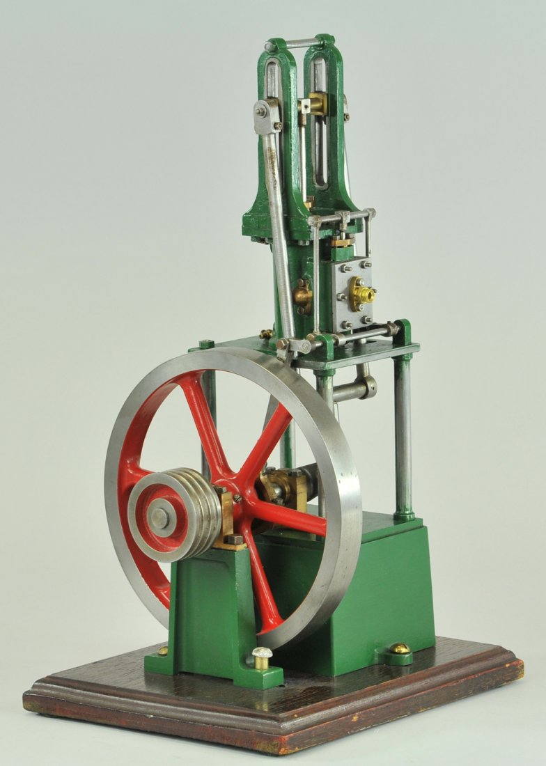 JAMES COOMBES TABLE ENGINE: Cast engine has oscillating cylinder, large size flywheel, pulley is nickeled. 15" h.