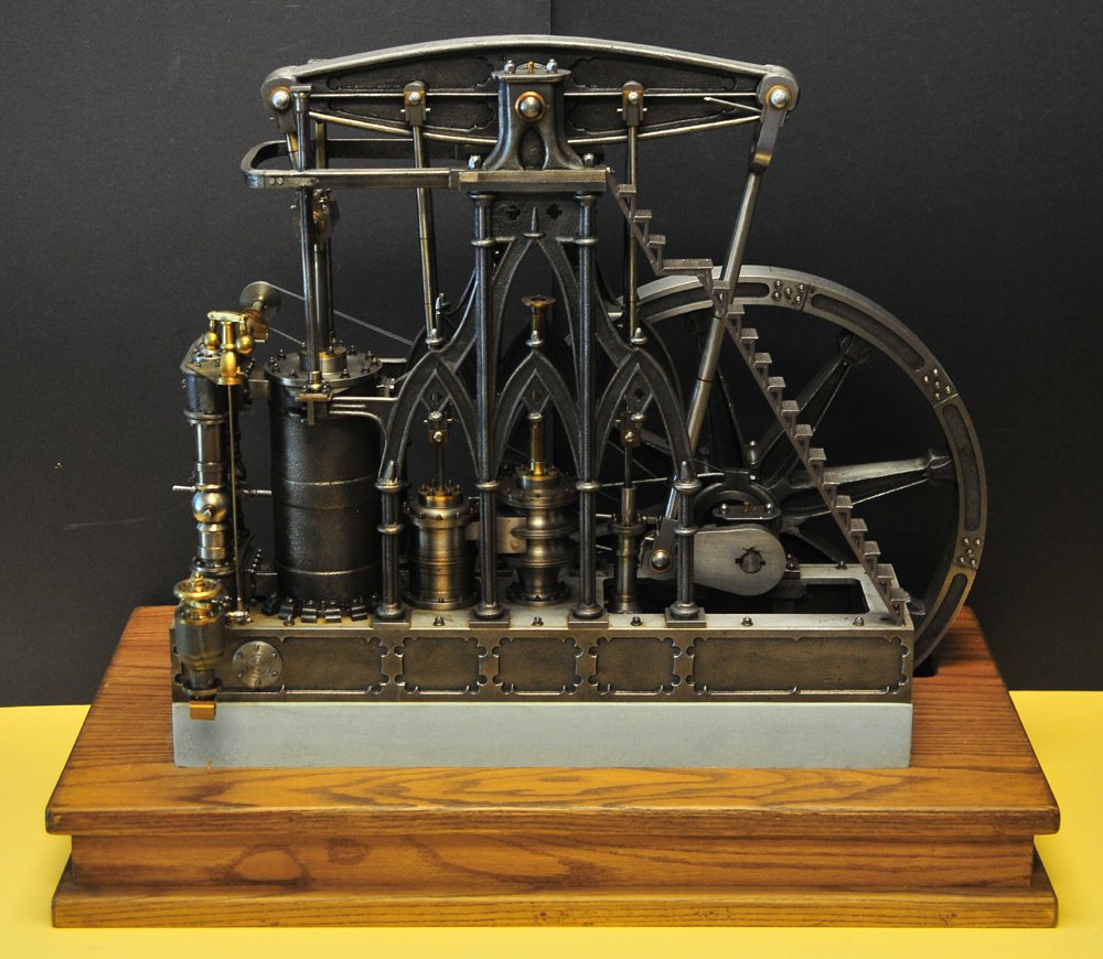 CATHEDRAL STYLED STEAM ENGINE: Machined for Klaus some fifteen years ago, it is an extraordinarily detailed example which reportedly took over a year to build, its cathedral styling has dramatic steps leading to top, extensive cast