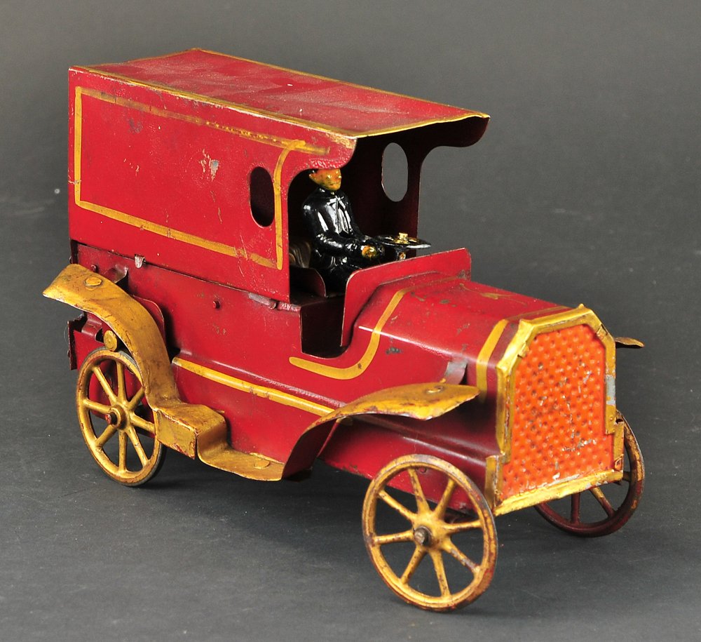 HILLCLIMBER AUTO VAN: D.P. Clark, pressed steel, enclosed van with cast iron driver, gold spoke wheels and fenders. 11" l.