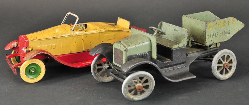 KINGSBURY ROADSTER AND BUDDY 'L' DUMP: Pressed steel, includes a tan & red roadster with electric lights and rumble seat, together with early repainted private label flivver that reads, "CURRY'S Hauling". 10" l.