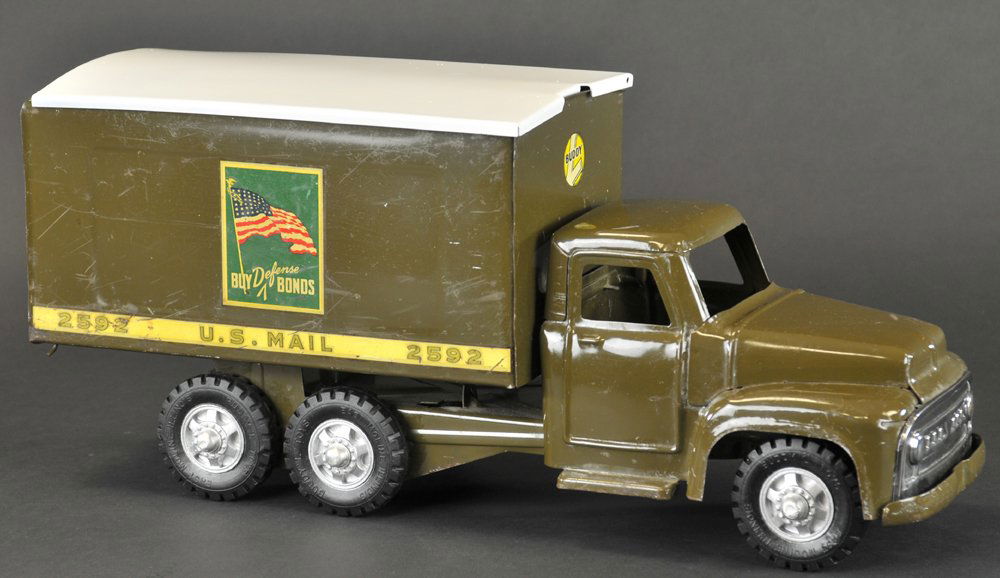 BUDDY 'L' U.S. MAIL TRUCK: Pressed steel, painted in olive green overall, decals on side of van body, rubber tires, roof lifts for storage, rear doors open. 21" l.
