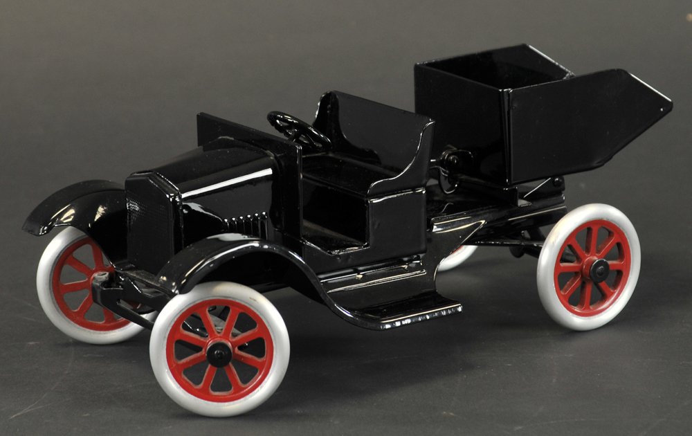 BUDDY 'L' FLIVVER DUMP TRUCK: Contemporary issue, pressed steel, painted in black overall, tilting dump bed, aluminum spoke wheels, red centers. 12" l.