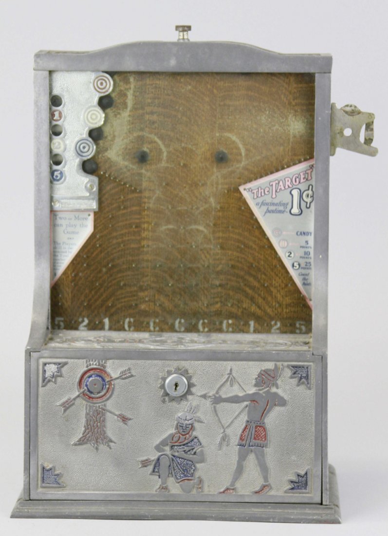 THE "TARGET" 1¢ ARCADE MACHINE: Coin operated, embossed Indian figures on panel, silver finish, wood panel interior, includes key. 16" h. x 11 1/2" w.