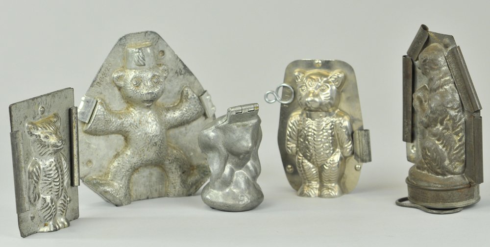 FIVE TEDDY BEAR CHOCOLATE MOLDS: All metal, various ages, unusual forms, jointed halves to form full body chocolate candy. 4 1/2" - 6 1/2" l.