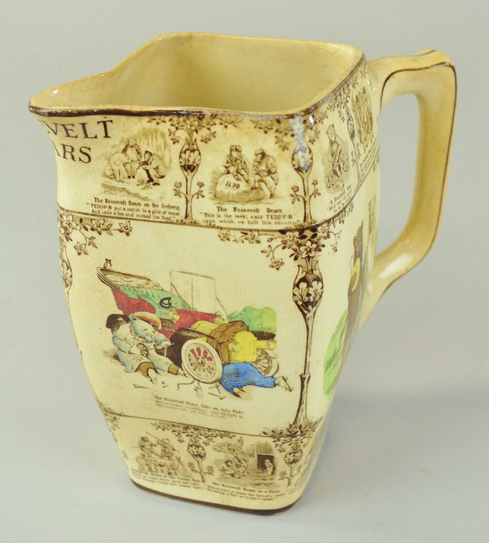 BUFFALO POTTERY ROOSEVELT BEARS MILK PITCHER: Graphic depiction of bears on all sides, features car scene, animal riding, and school room, marked "1907 Buffalo Pottery Copyright Ed Stern & Co." 8" h.