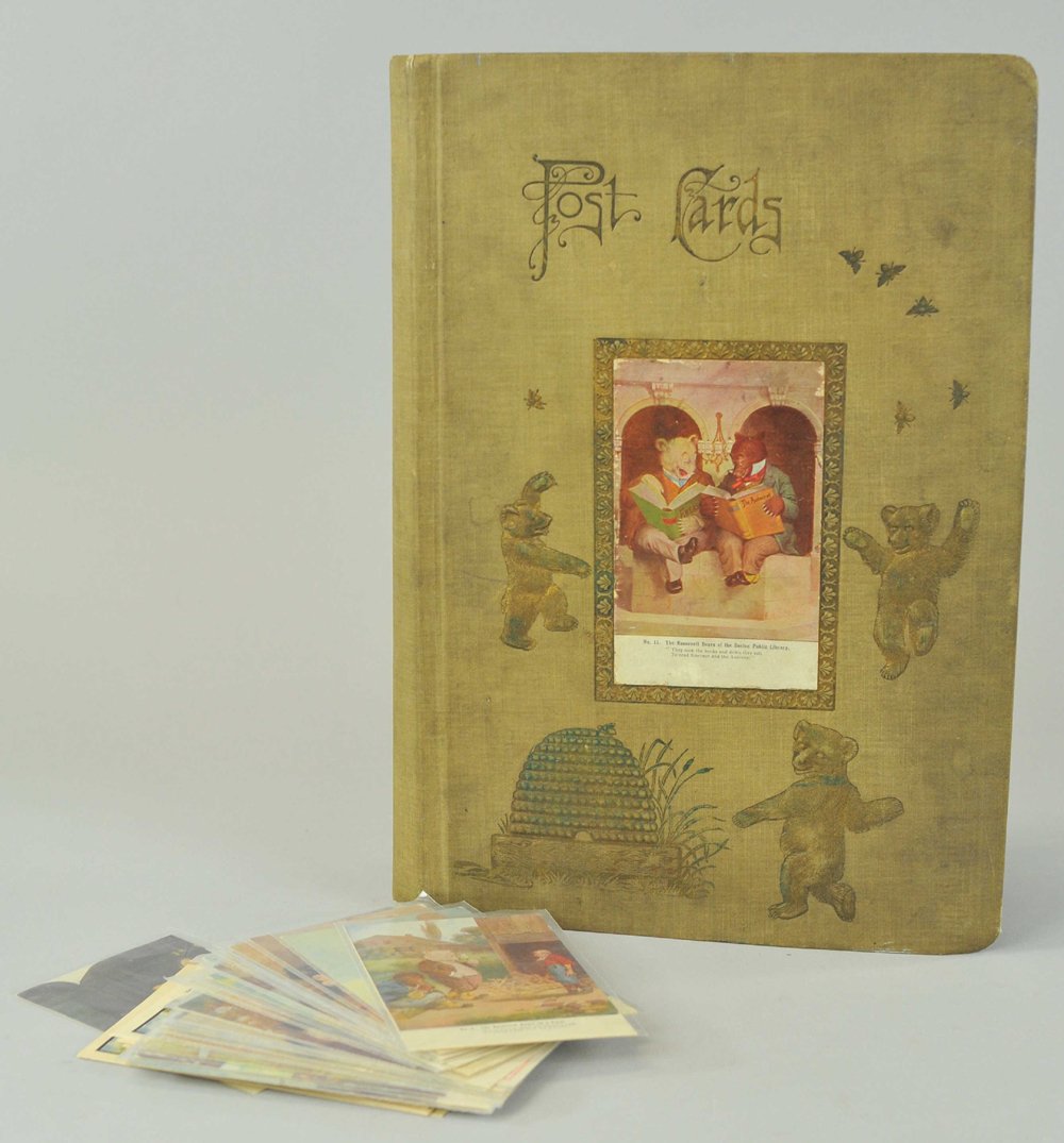 ROOSEVELT TEDDY BEAR POSTCARD ALBUM: Hard cover album depicts bears and embossed bee hive together with Roosevelt postcards that include complete set of 1-16 and most of 17-30, along with bear note cards.