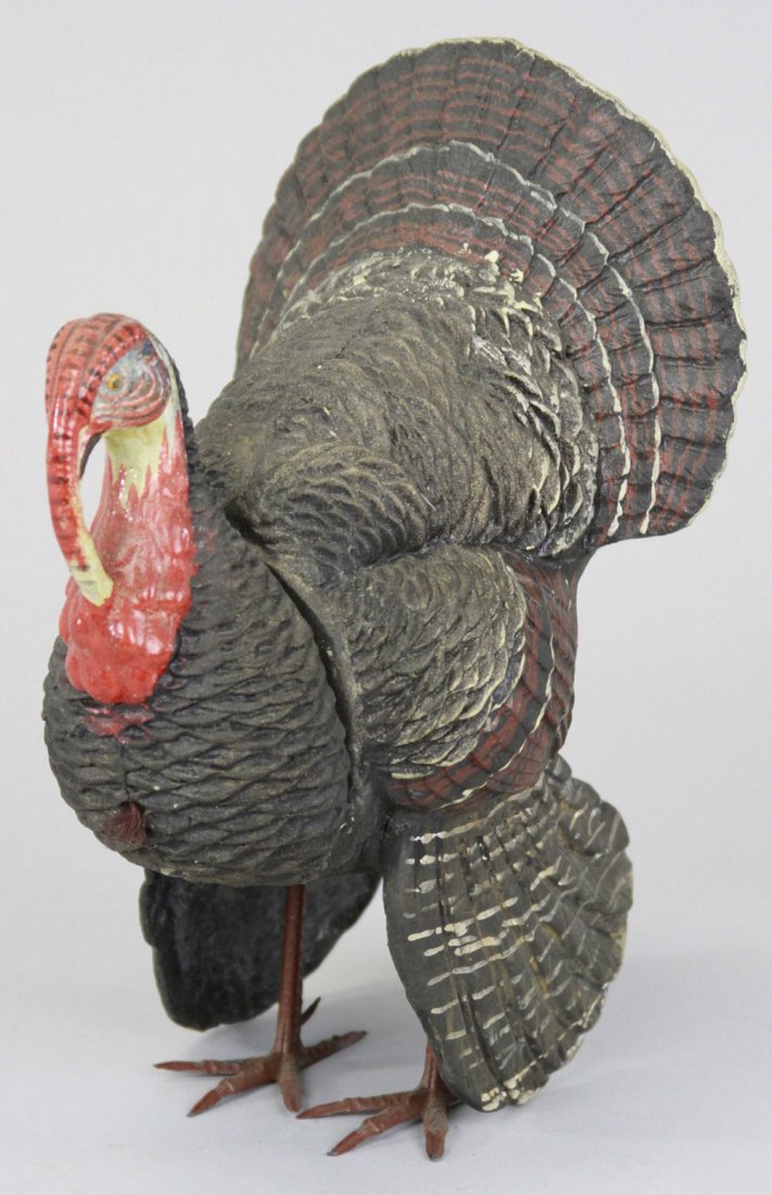 LARGE TURKEY CANDY CONTAINER: Germany, composition, hand painted, full figure w/lead feet, head separates for candy retrieval, very colorful piece. 9 1/4" h.