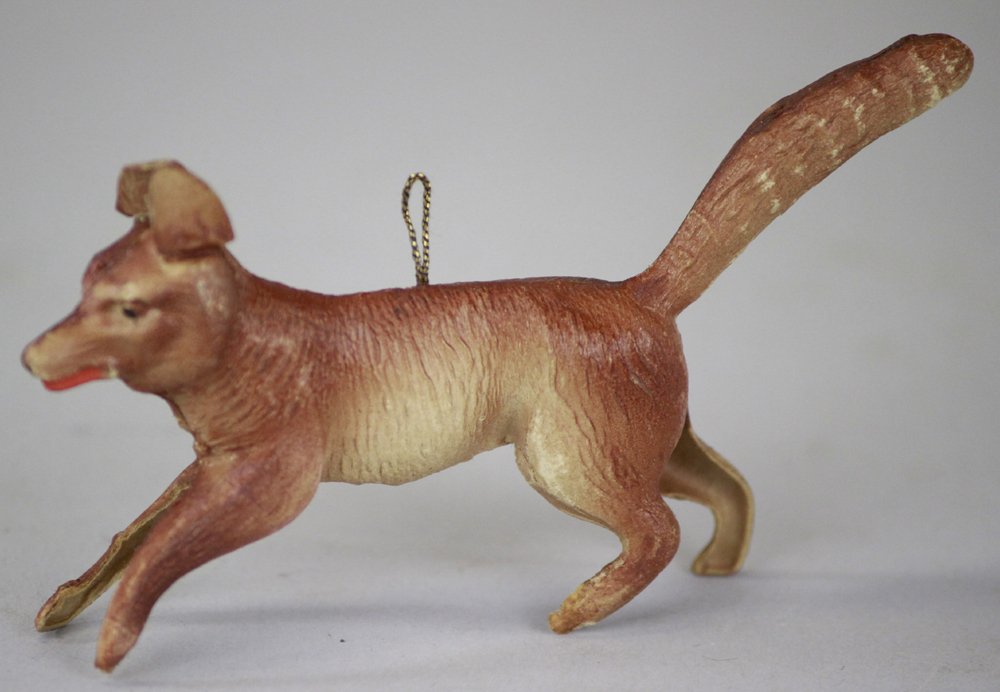 GERMAN DRESDEN RED FOX: Red fox painted in realistic reddish-brown color, posed in full run with ears flying straight up in the air, long fluffy tail completes the figure. 3 1/4" l.