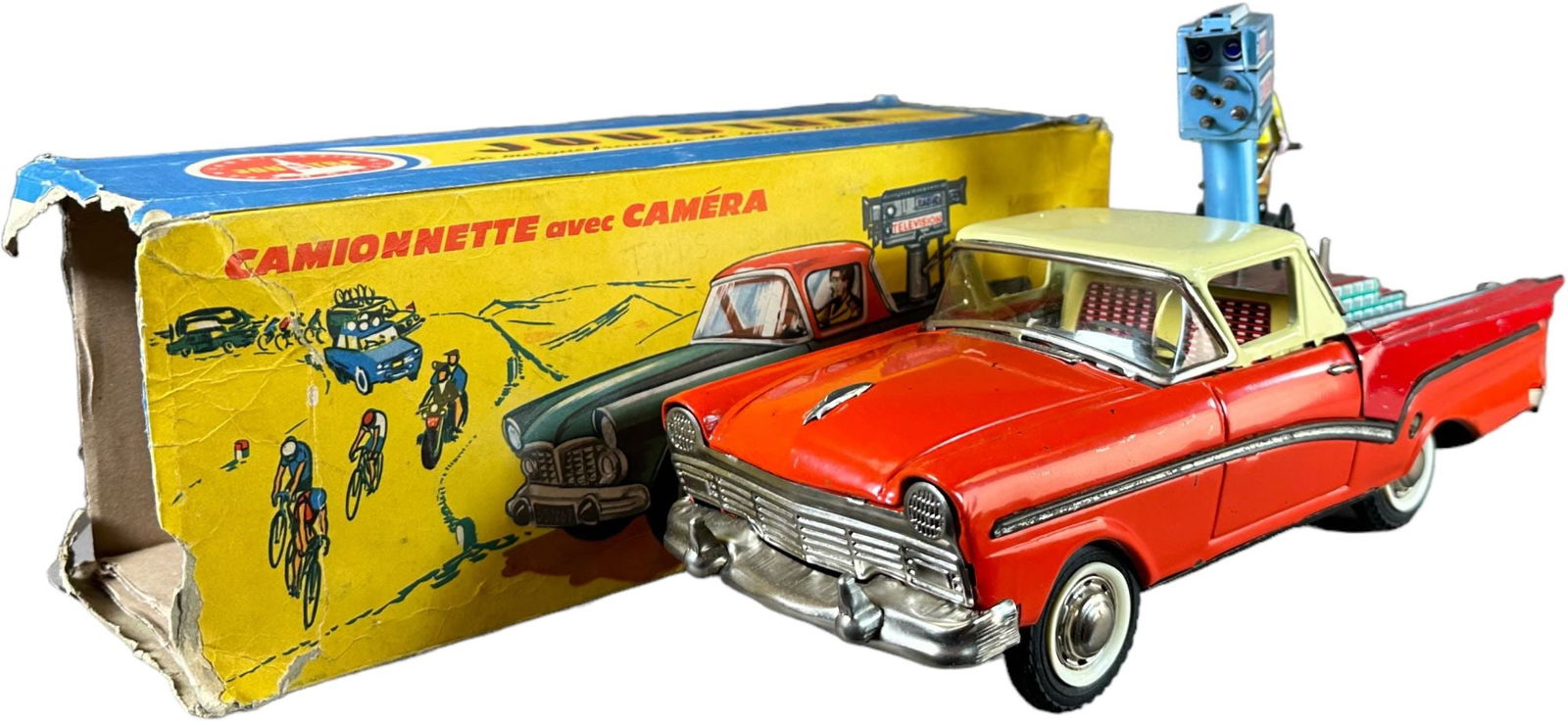 BOXED JOUSTRA TELEVISION CAMERAMAN TRUCK: 31. BOXED JOUSTRA TELEVISION CAMERAMAN TRUCK | France, seldom found original box, clever design with a wind up mechanism which alternates between driving rear wheels, then disengaging to turn camera s