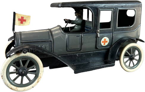 KARL BUB RED CROSS AMBULANCE: 62. KARL BUB RED CROSS AMBULANCE | Germany, wind-up motor, scarce example of a tinplate limousine body wearing lithographed badges to double as an early medical wagon. Provenance: Sam Downey