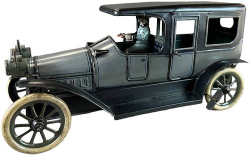 KARL BUB SALOON LIMOUSINE: 63. KARL BUB SALOON LIMOUSINE | Germany, wind-up motor, early example circa 1915. Provenance: The Donald Kaufman Collection. | 13" l. | Some minor factory touchups at edges of black frame and doors