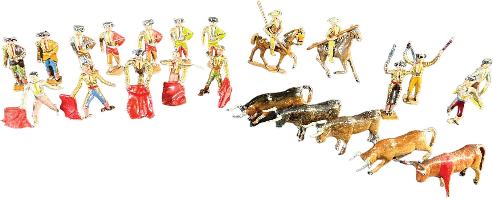 RARE CASANELLAS SPANISH BULL FIGHT SET: 289. RARE CASANELLAS SPANISH BULL FIGHT SET | Twenty-three piece bull fight set from a very rare Spanish maker. Provenance: Oscar Hijuelos Collection. | 48mm | Some touch-up to one red flag, otherwise