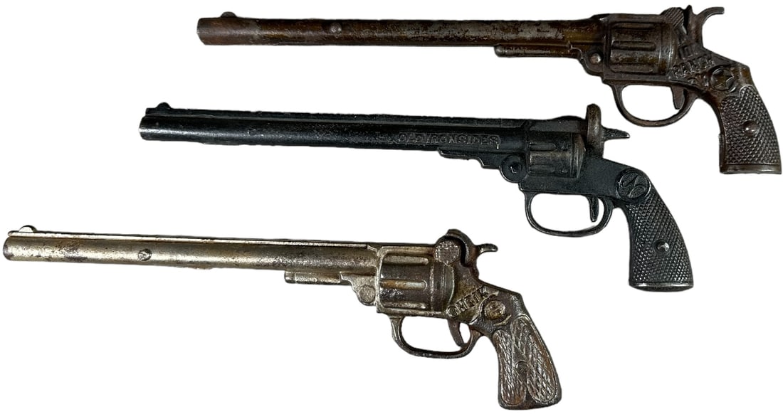 101 RANCH, OLD IRONSIDE & SHEIK CAP GUNS: 1381. 101 RANCH, OLD IRONSIDE & SHEIK CAP GUNS | 10" l. | (Very Good to Excellent Condition) | $400 - $600