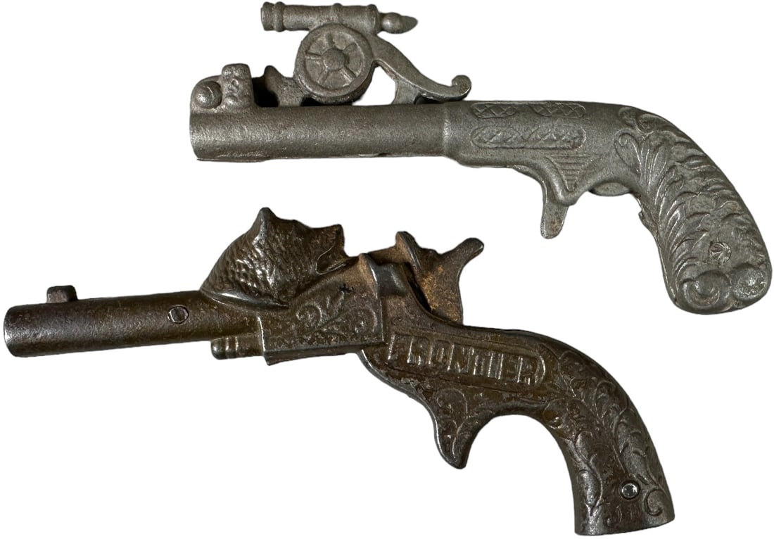 KENTON CANNON & FRONTIER CAP GUNS: 1421. KENTON CANNON & FRONTIER CAP GUNS | 5.t" l. | (Very Good to Excellent Condition) | $400 - $600
