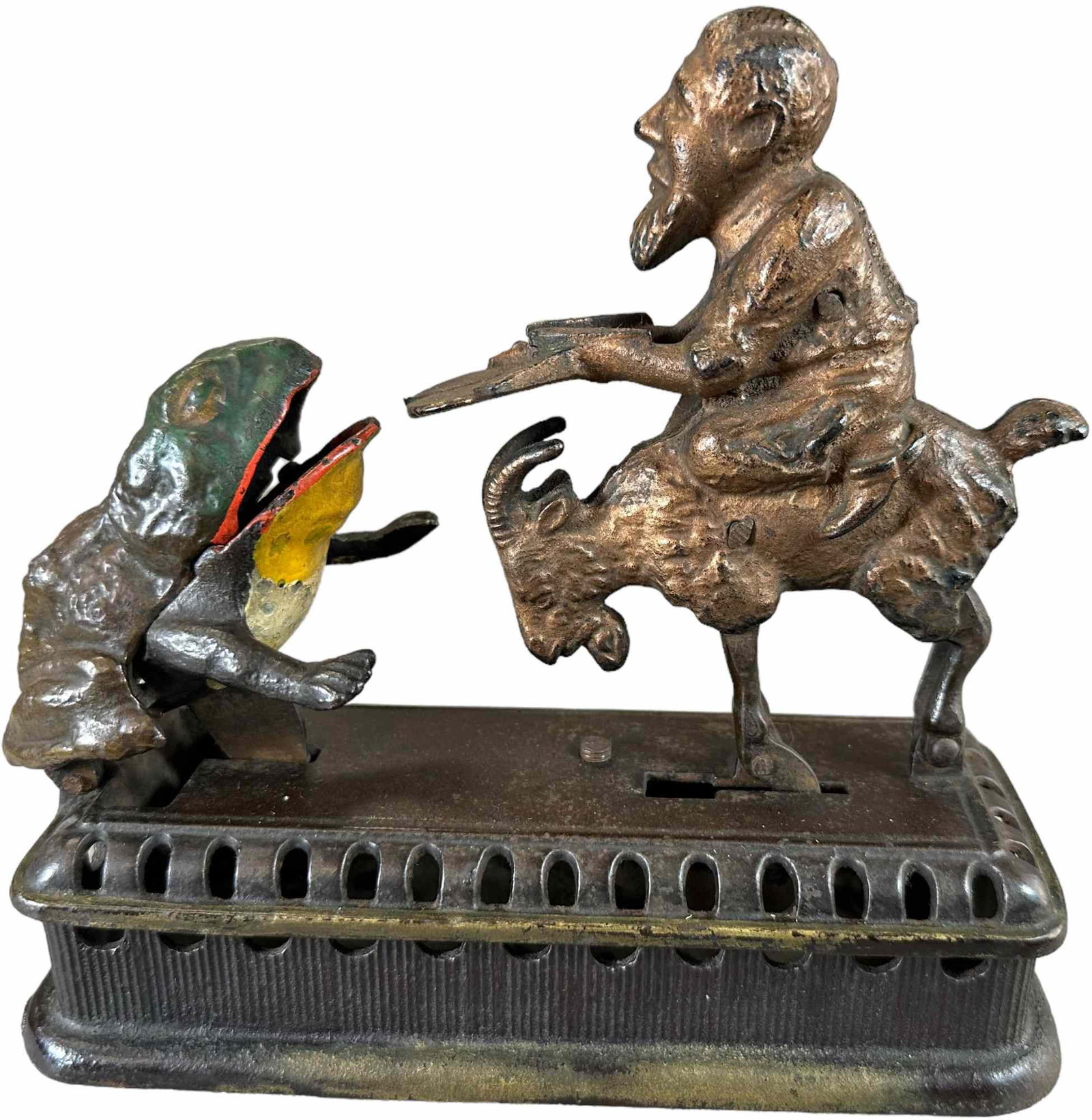 INITIATING SECOND DEGREE MECHANICAL BANK: 140. INITIATING SECOND DEGREE MECHANICAL BANK | Mechanical Novelty Works, also known as ?Goat, Frog and the Old Man,? lifting goat?s tail causes spring forward motion and man deposits coin from tray i