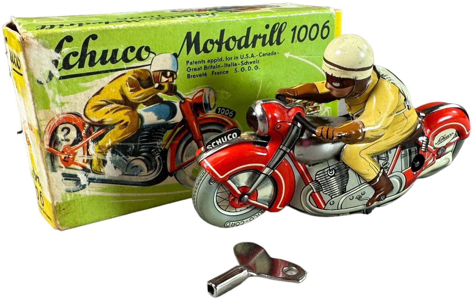 SCHUCO MOTODRILL 1006 MOTORCYCLE: 42. SCHUCO MOTODRILL 1006 MOTORCYCLE | 5" l. | Two inner box flaps torn but present, one missing, toy in (Excellent to Pristine Condition) | $150 - $300