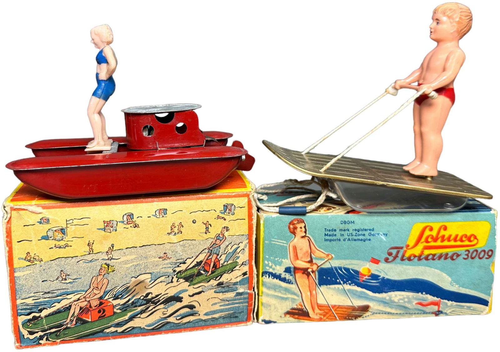 TWO BOXED WATER SKIER TOYS (1 of 4)