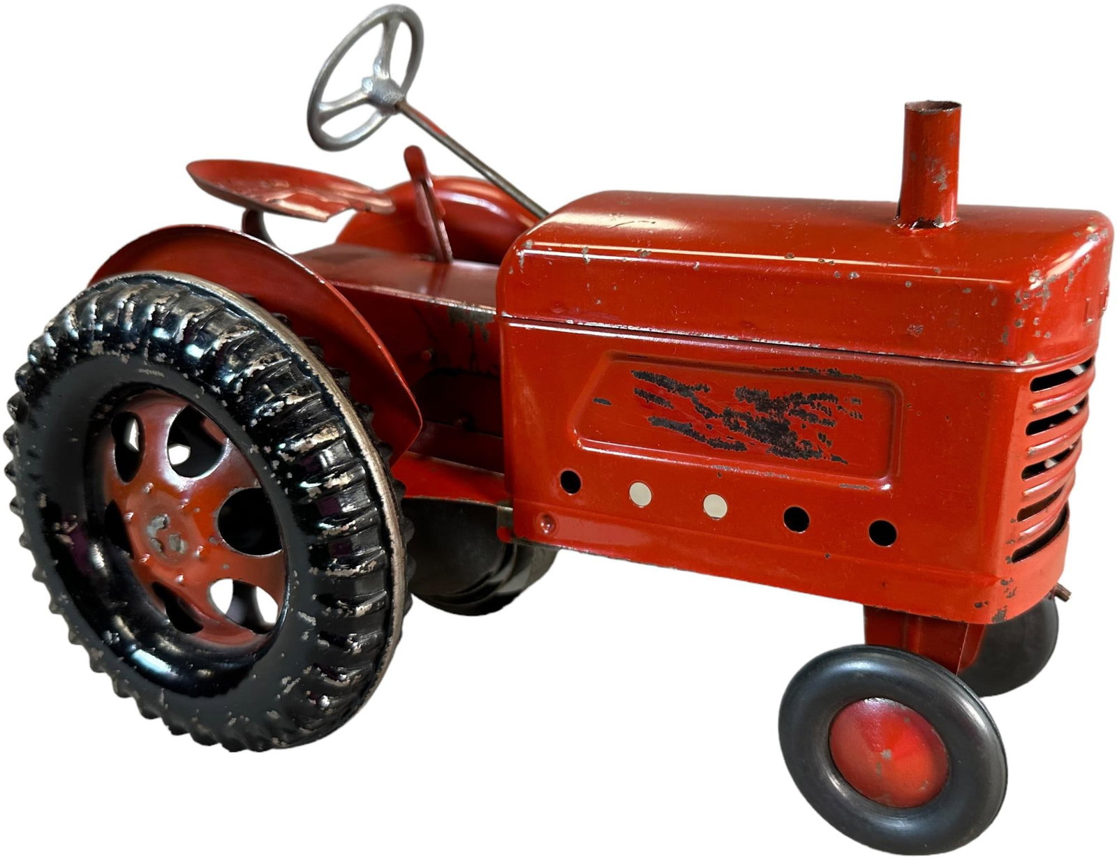 LUXIA GERMAN STEEL WIND-UP TRACTOR: 311. LUXIA GERMAN STEEL WIND-UP TRACTOR | 8.5" l. | (Very Good to Excellent Condition) | $50 - $100