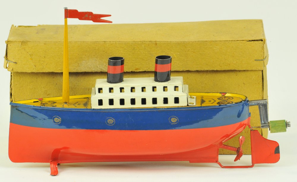 ARNOLD LINER WITH BOX: c. 1920, #700/00, lithographed tin, inertia powered, upper deck cabin features two funnels, simple mast, lithographed decking with detailed graphics. 7" l.