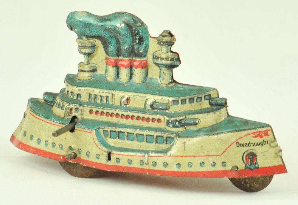 FISCHER BATTLESHIP PENNY TOY: Germany, lithographed tin, done in blue colors, three funnel ship, extensive graphics, nicely embossed example, flywheel version. 4" l.