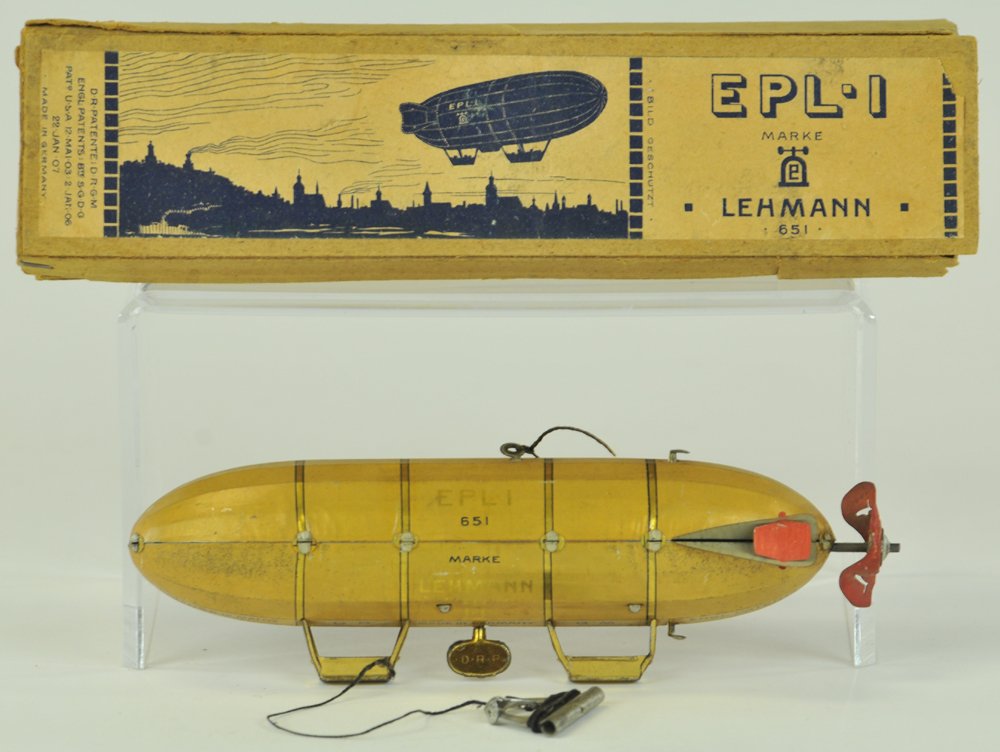 LEHMANN EPL I DIRIGIBLE WITH BOX: Germany, lithographed tin, two gondolas appears underneath body, celluloid propellers, clockwork mechanism.