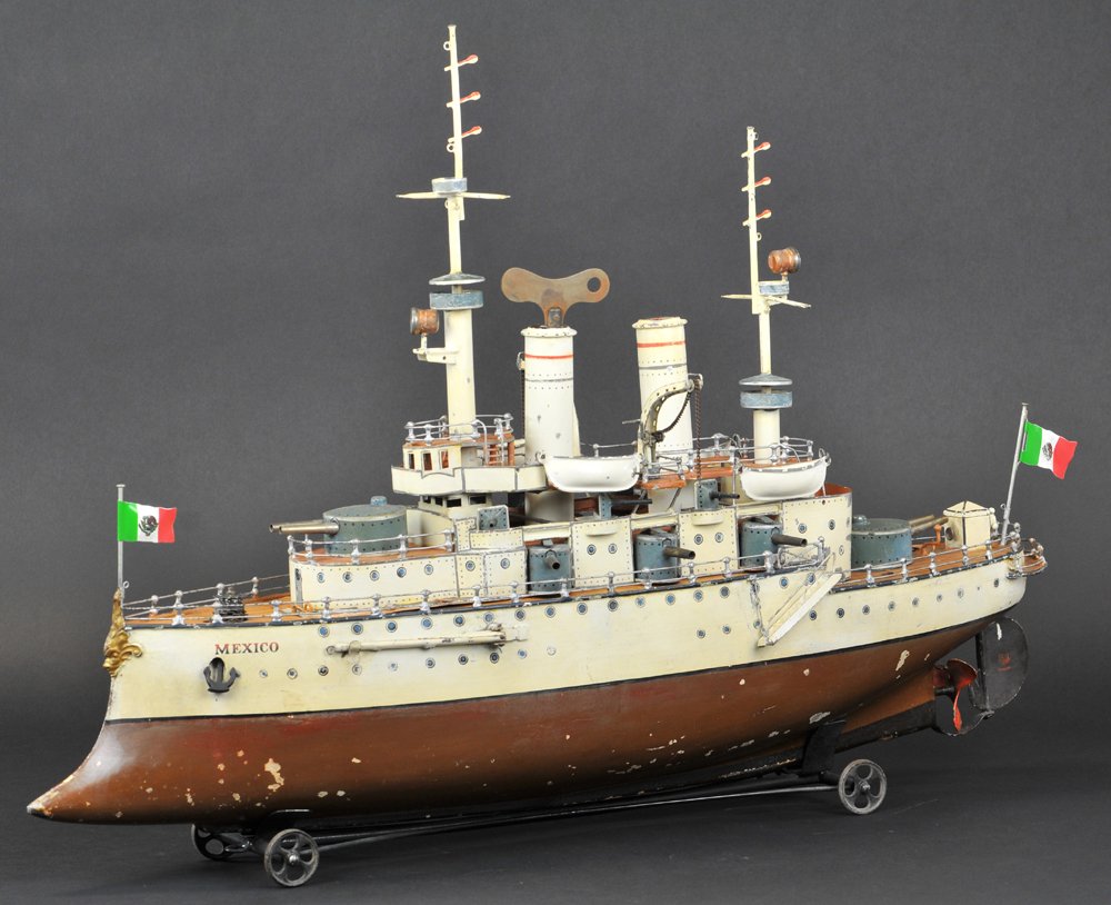 MARKLIN "MEXICO" BATTLESHIP: Germany, #5121, Series II, hand painted beauty, done in brown and white hull, superstructure is quite fabulous and busy, guns are positioned in a row at sides and deck level on stern, upper deck level