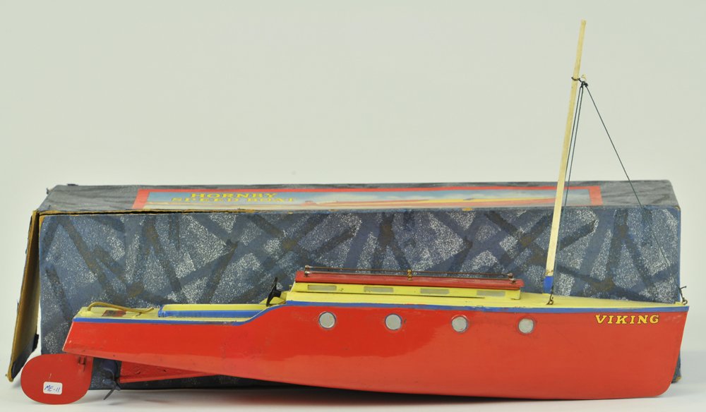 HORNBY CABIN CRUISER WITH BOX: Meccano Ltd., Liverpool, England, pressed steel, c. 1930's, decal reads, "Viking," this speedboat was issued as No. 5, red and cream colors, clockwork powered, single wood mast. 18" l.