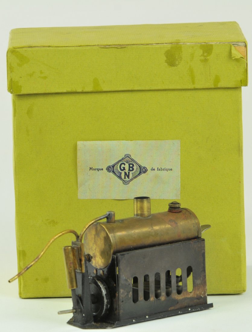 BING STEAM ENGINE: Includes box, brass horizontal boiler made to fit into boat hull for power, these ships could use steam, electric, or clockwork motors, made to fit properly. 4 1/4" l.