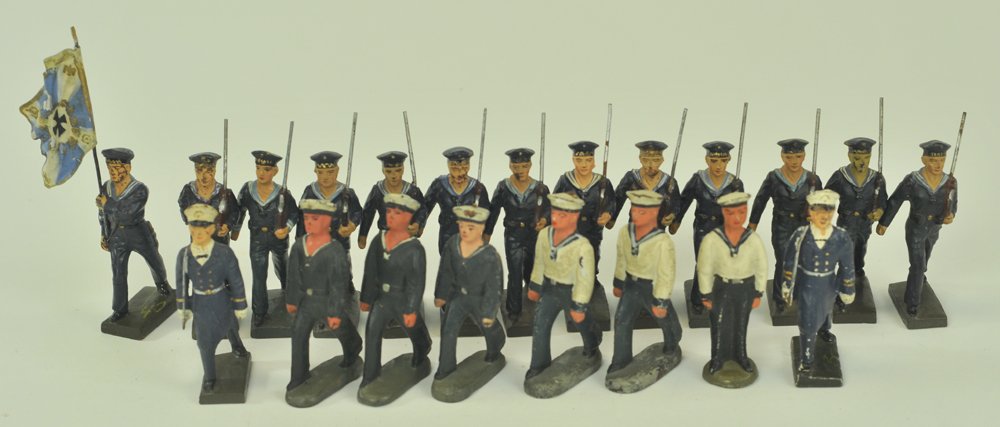 ASSORTMENT OF 7cm LINEOL FIGURES: Composition, includes 13 German sailors marching w/ standard bearer, 2 officers, 5 without weapons, and one at attention.