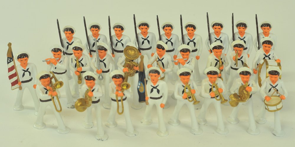 COMBAT READY COLLECTIBLES & MISC. SOLDIER SETS: Includes three contemporary Britains sets, twenty-seven CRC examples, Edmund's U.S. Navy Service dress boxed set, two collector's figures, Naval sweetheart couple and incomplete Ducal U.S. Marine set.