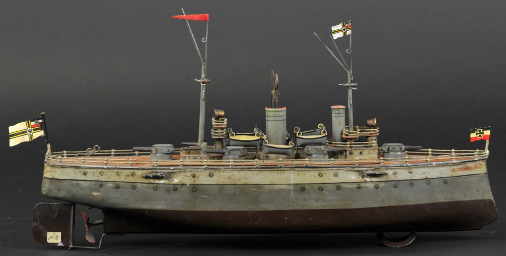 MARKLIN "SCHWABLE" BATTLESHIP: Germany, circa 1915, #5129/42, hand painted, typical exacting detail to deck appointments, circular positioned center lifeboats, two masts with antennas, six revolving guns, tiered observation decks w