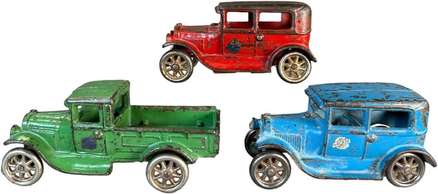 THREE ARCADE FORD MODEL A AUTOMOBILES