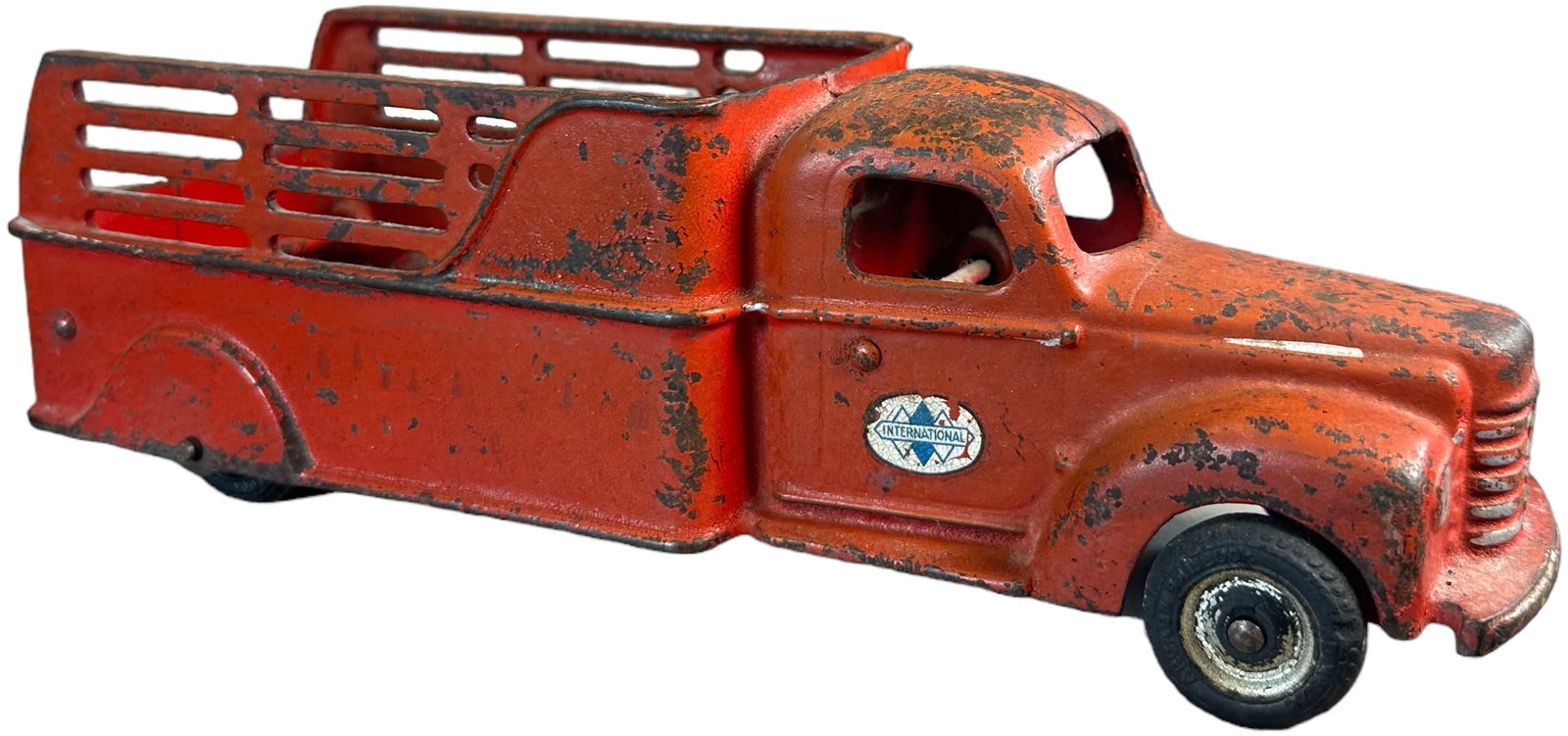 ARCADE 1941 INTERNATIONAL STAKE TRUCK: 89. ARCADE 1941 INTERNATIONAL STAKE TRUCK | 11.5" l. | Back tires replaced, (Very Good Condition) | $150 - $300