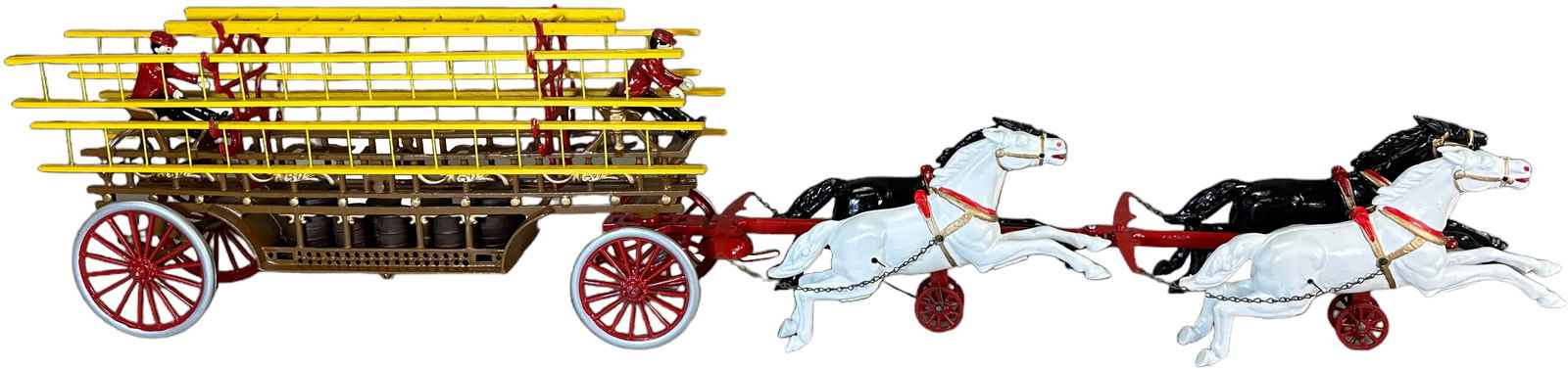 OVERSIZED DENT HOOK AND LADDER WAGON: 122. OVERSIZED DENT HOOK AND LADDER WAGON | 34" l. | Restored: glass beaded, hand painted, and baked. Displays on the shelf as (Pristine Condition) | $500 - $1,000