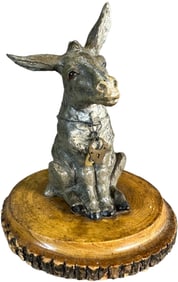 SEATED DONKEY WOOD BASE SPELTER BANK