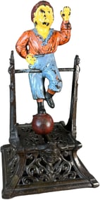 BOY ON TRAPEZE MECHANICAL BANK