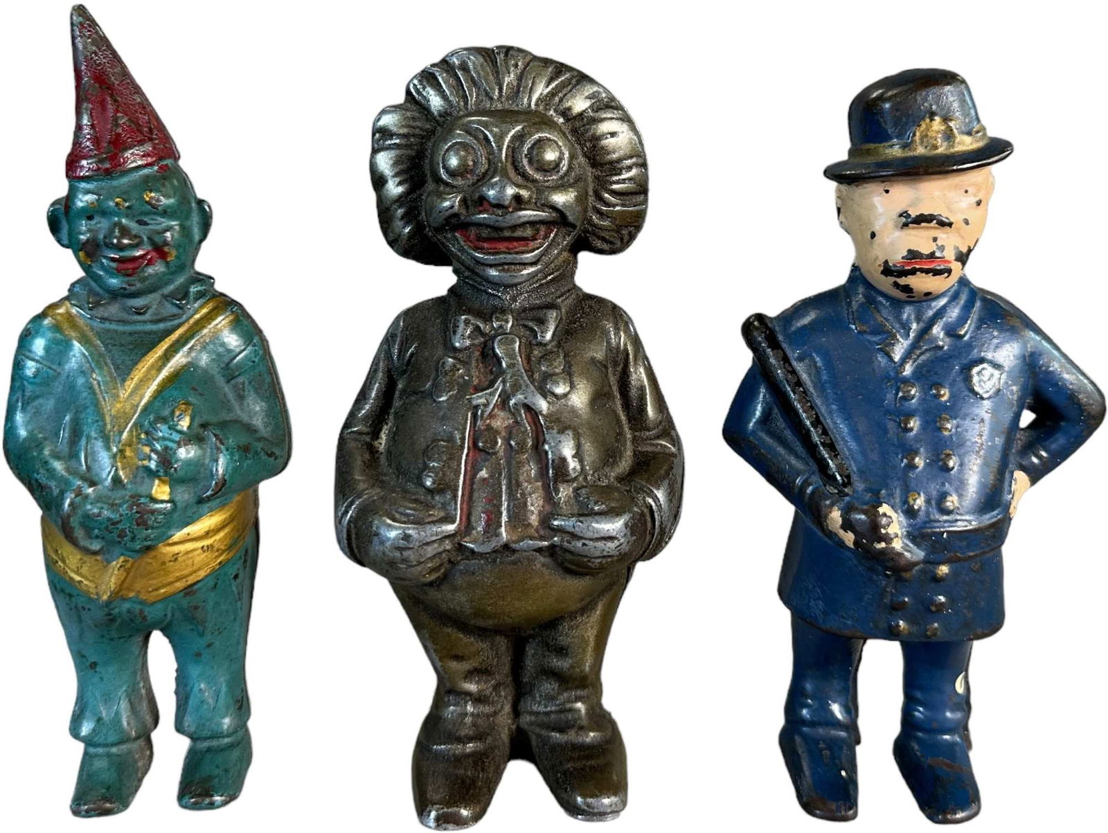 CLOWN W/ GOLLIWOG & MULLIGAN COP STILL BANKS (1 of 6)