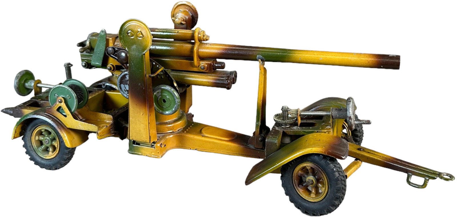 LINEOL CAMOUFLAGED GUN ON CHASSIS: 211. LINEOL CAMOUFLAGED GUN ON CHASSIS | Large anti aircraft 88 mm gun on wheeled chassis, all gun adjustments working. | 14" | (Excellent Condition) | $200 - $400